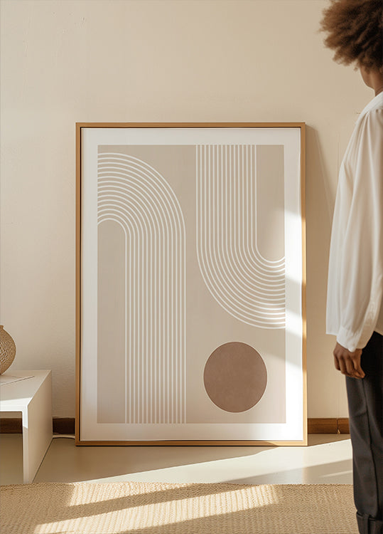 Plakat w kształcie beżowego łuku