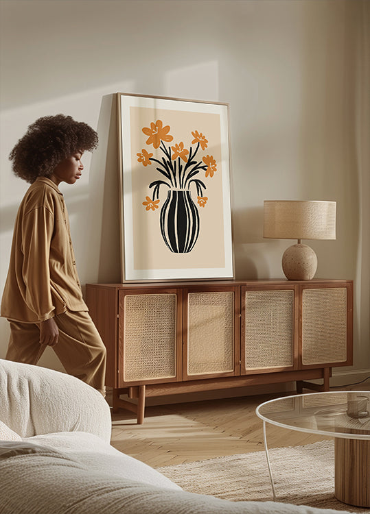 Plakat z pomarańczowymi kwiatami w wazonie